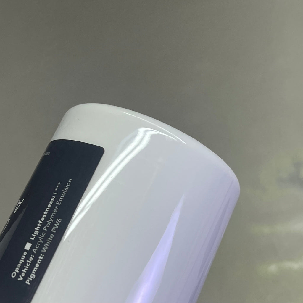 Upside down view of bottom of Master's Touch titanium white acrylic paint bottle - 16.9 fl oz