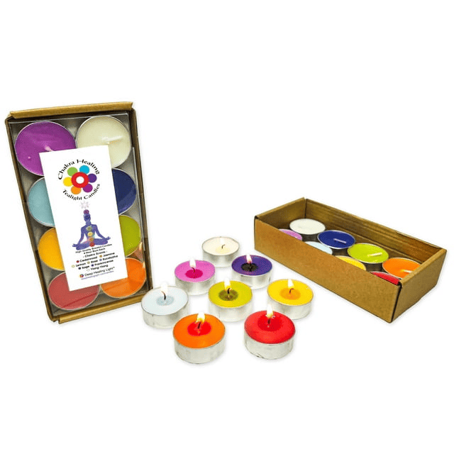 Colorful chakra tealight candles in box with Chakra Healing label on white background - alternate view
