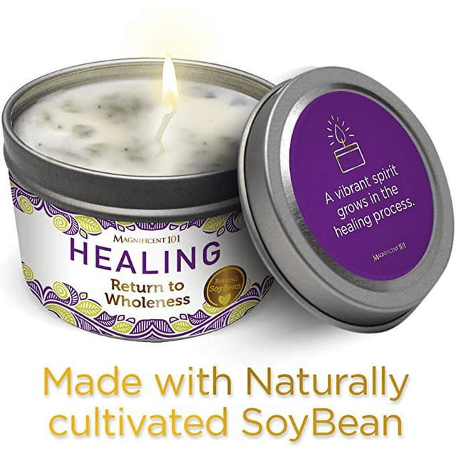 Lit Healing candle in tin with purple labeled lid and Made with Naturally cultivated SoyBean text on white background