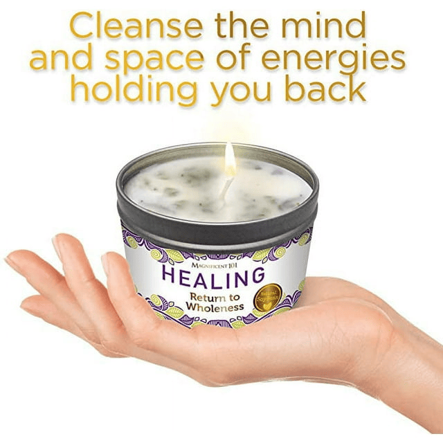 Healing candle in tin held in hand with text about cleansing energies