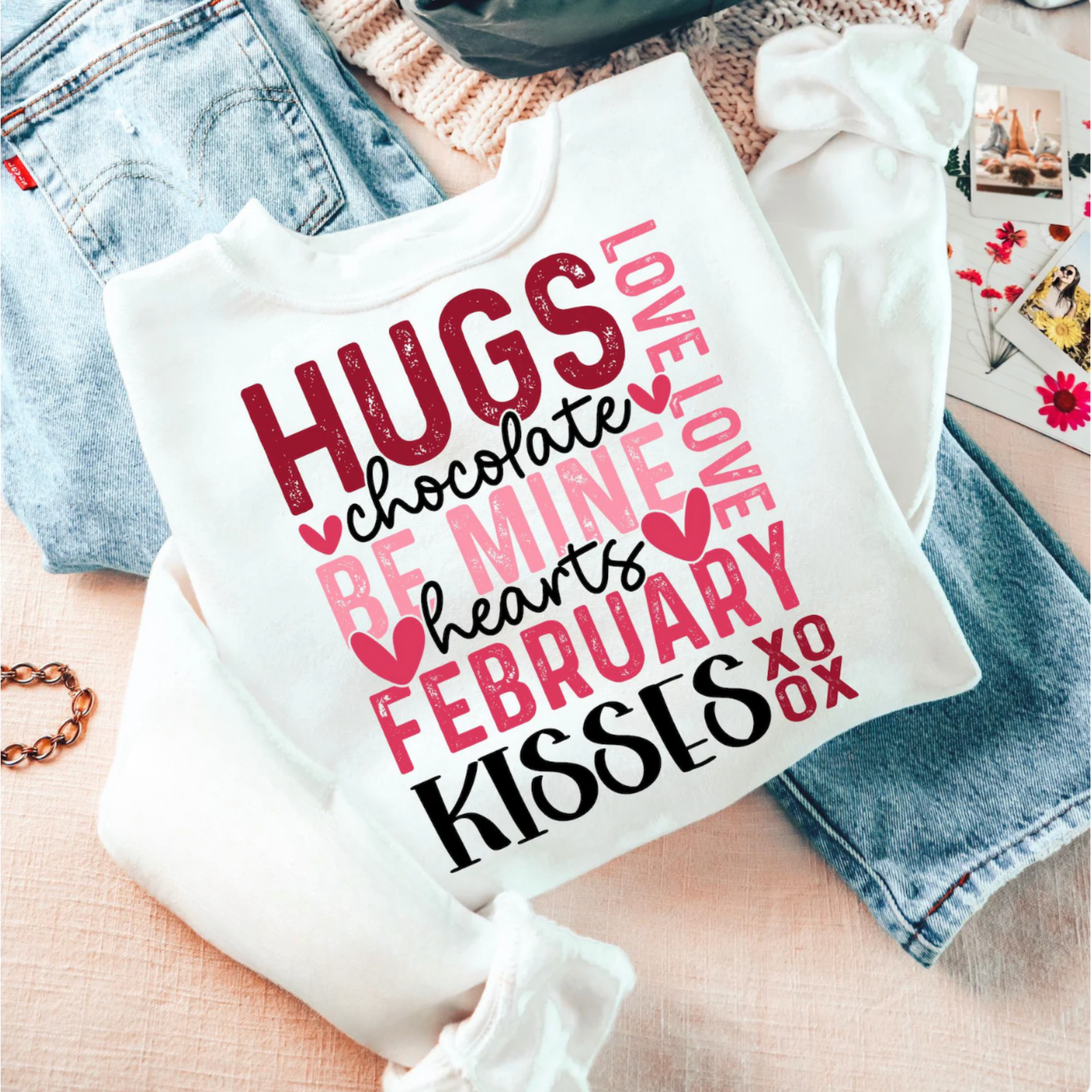 White long sleeve Valentine's Day t-shirt with Hugs Kisses graphic design - cute Valentine's Day tee and crewneck