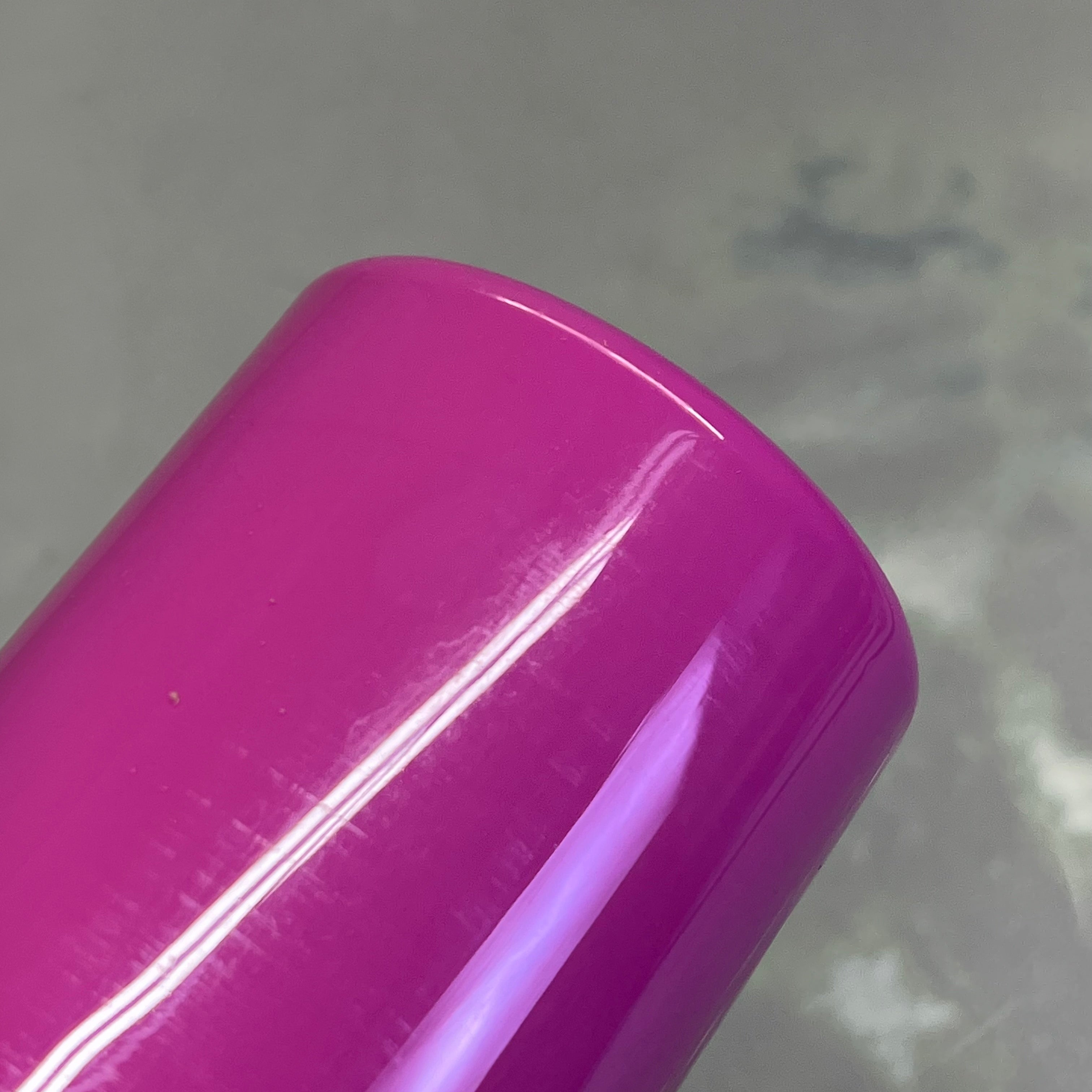 Upside down view of bottom of Master's Touch light magenta acrylic paint bottle - 16.9 fl oz