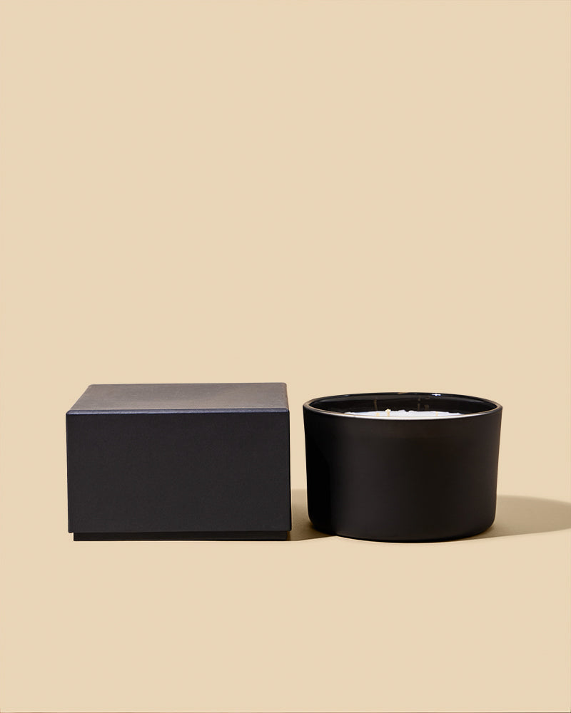 Matte Black 18oz candle in Dream Candle Vessel with matching Dream Box on beige background - professional candle packaging