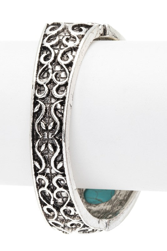 Back view of stone embossed Western cuff bracelet showing embossed design underneath - boho hinged jewelry