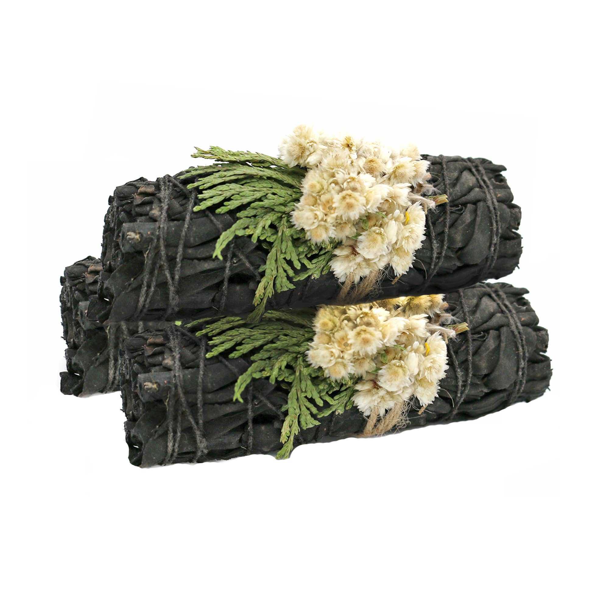 Three bundles of white sage with flowers and greenery on white background - Midnight Bloom floral smudge sticks