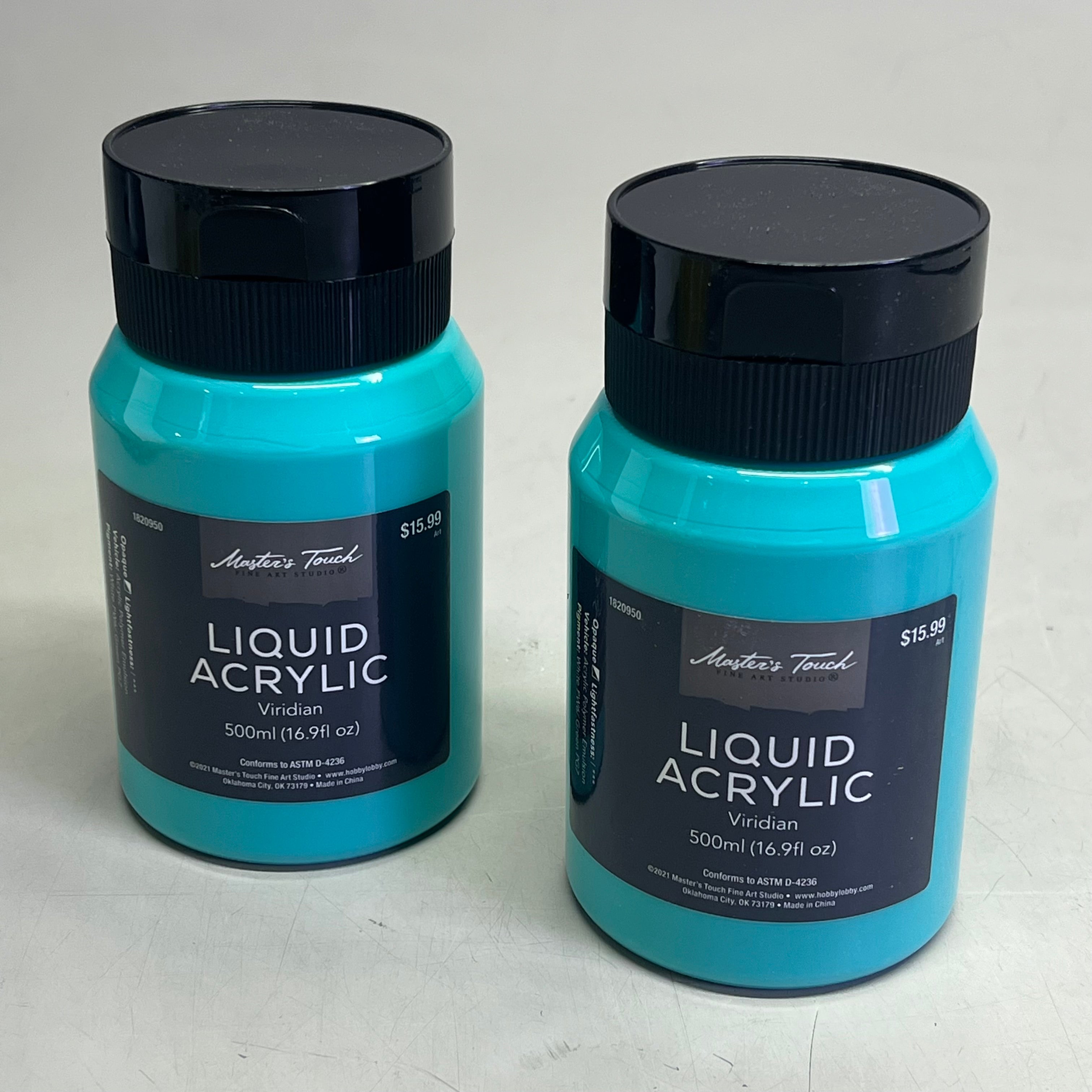 Two bottles of Master's Touch Liquid Acrylic Viridian paint in transparent plastic bottles showing blue-green paint color on white background - 2 pack acrylic paint set
