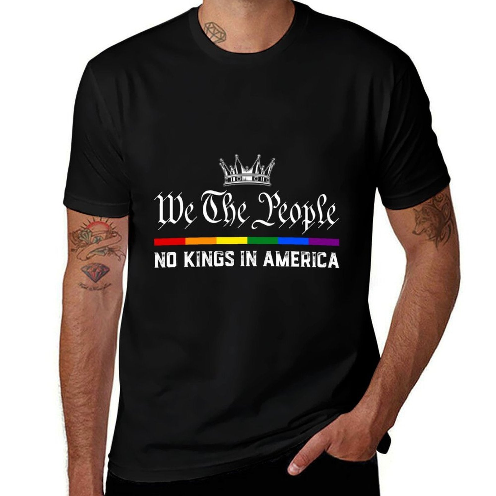  Man wearing black lightweight t-shirt with 'We The People No Kings in America' design featuring rainbow flag on white background