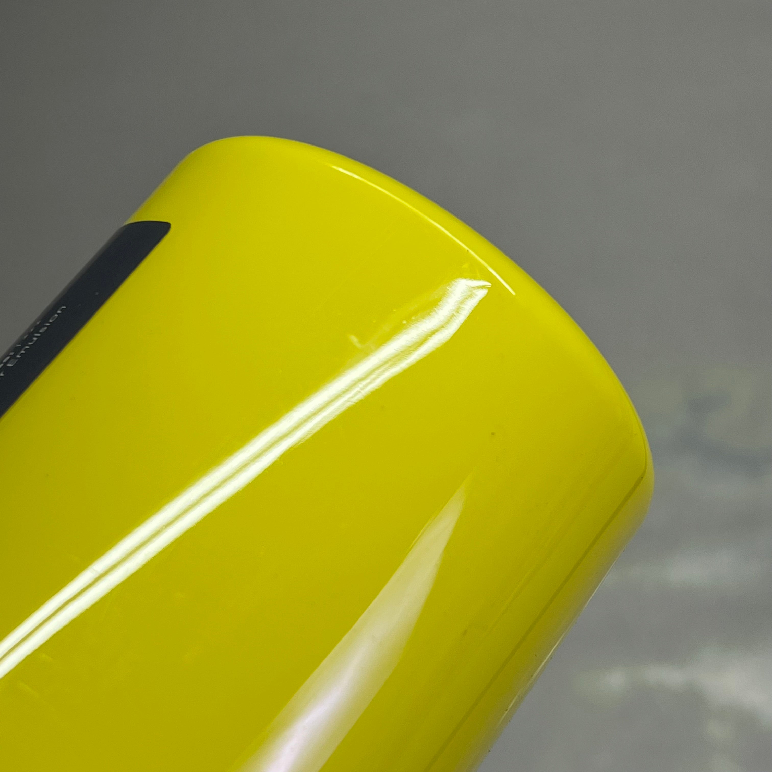 Upside down view of bottom of Master's Touch lemon yellow acrylic paint bottle - 16.9 fl oz