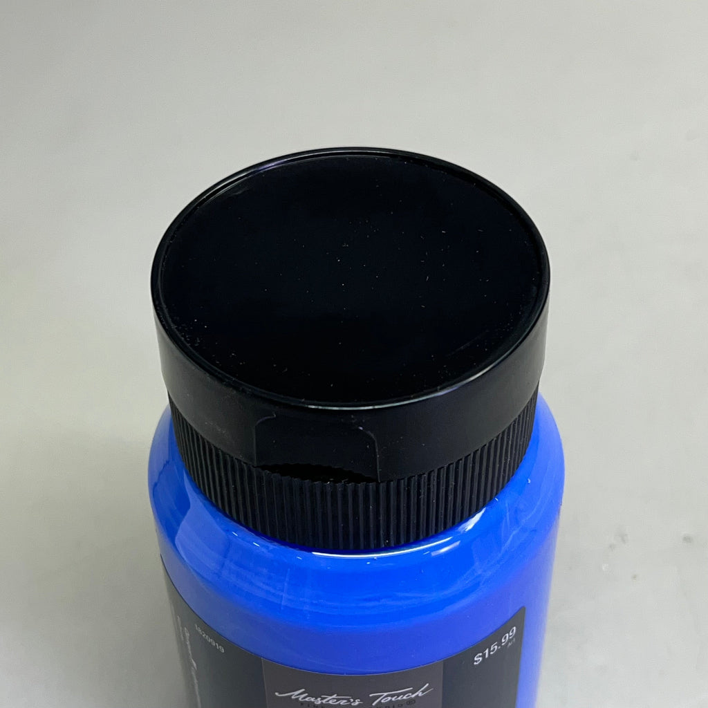 Close-up top view of Master's Touch Cobalt Blue acrylic paint bottle with black lid showing blue paint color through transparent plastic container on white background