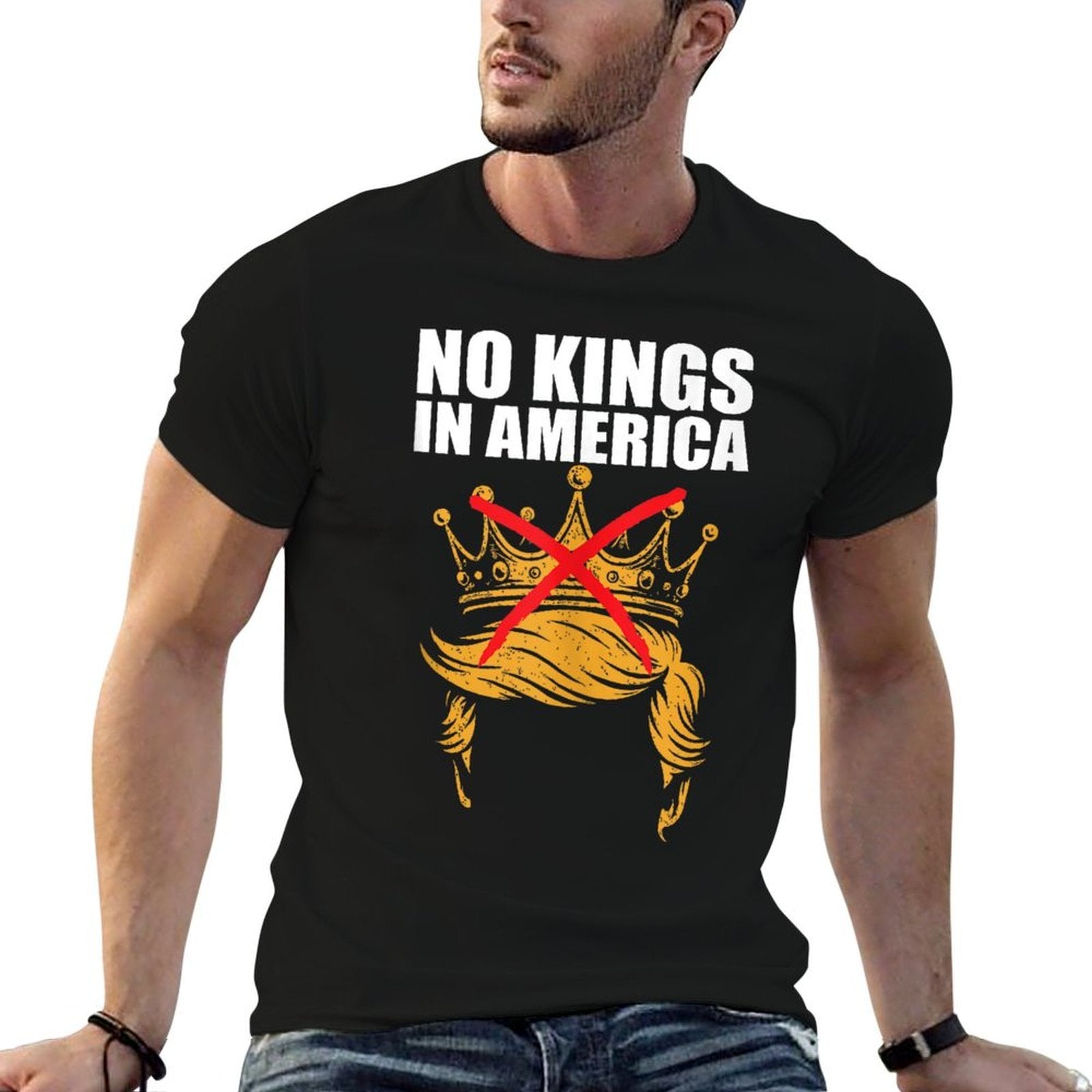 Man wearing a black t-shirt with 'No Kings in America' graphic design.