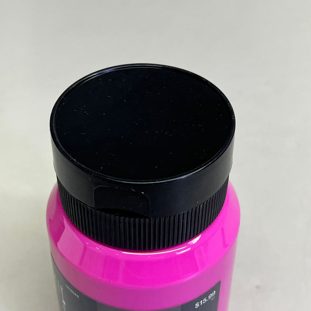 Close up of black bottle cap on Master's Touch light magenta acrylic paint bottle on white background