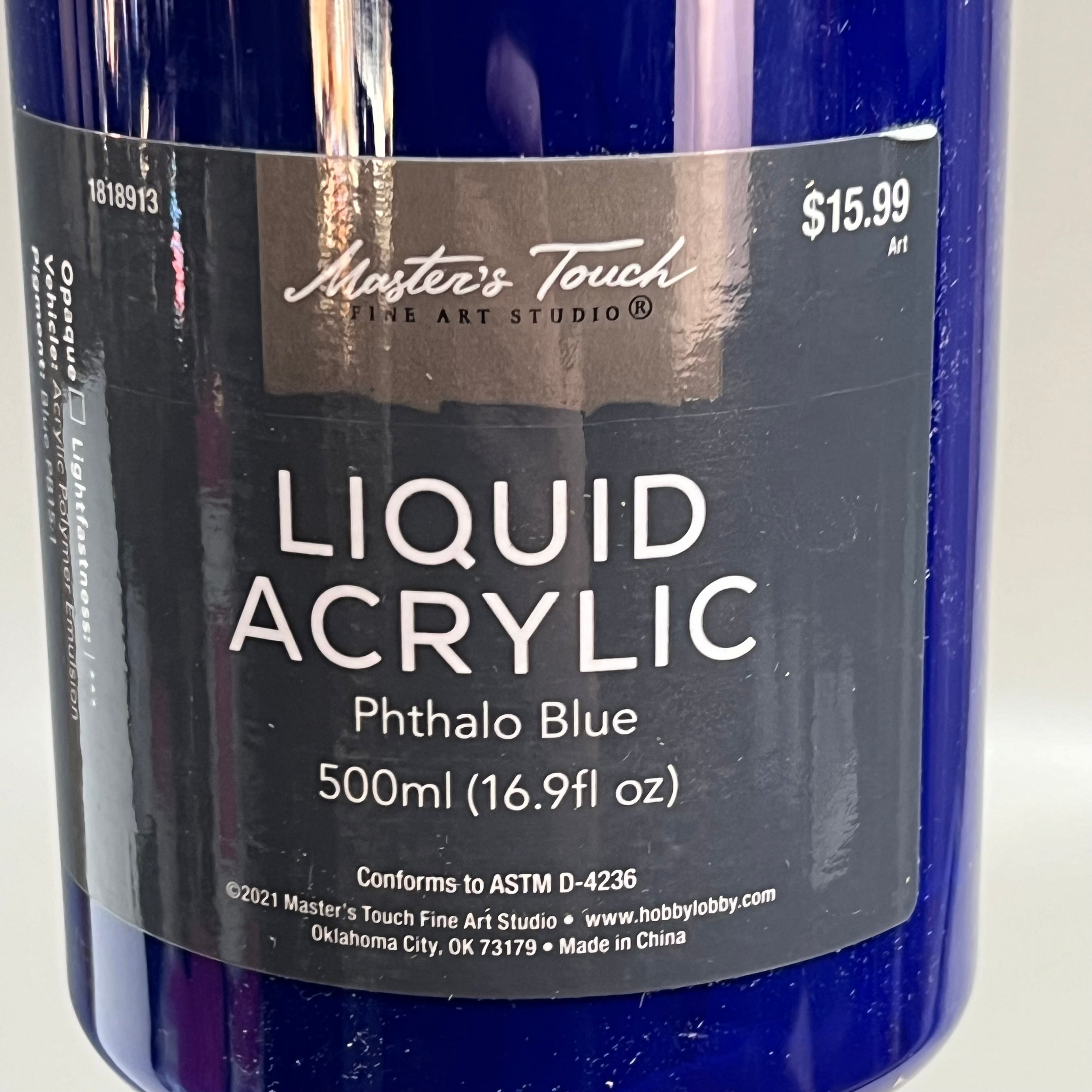 Master's Touch Liquid Acrylic Phthalo Blue paint bottle with product label close-up showing transparent plastic bottle with dark blue paint on white background - 16.9 oz