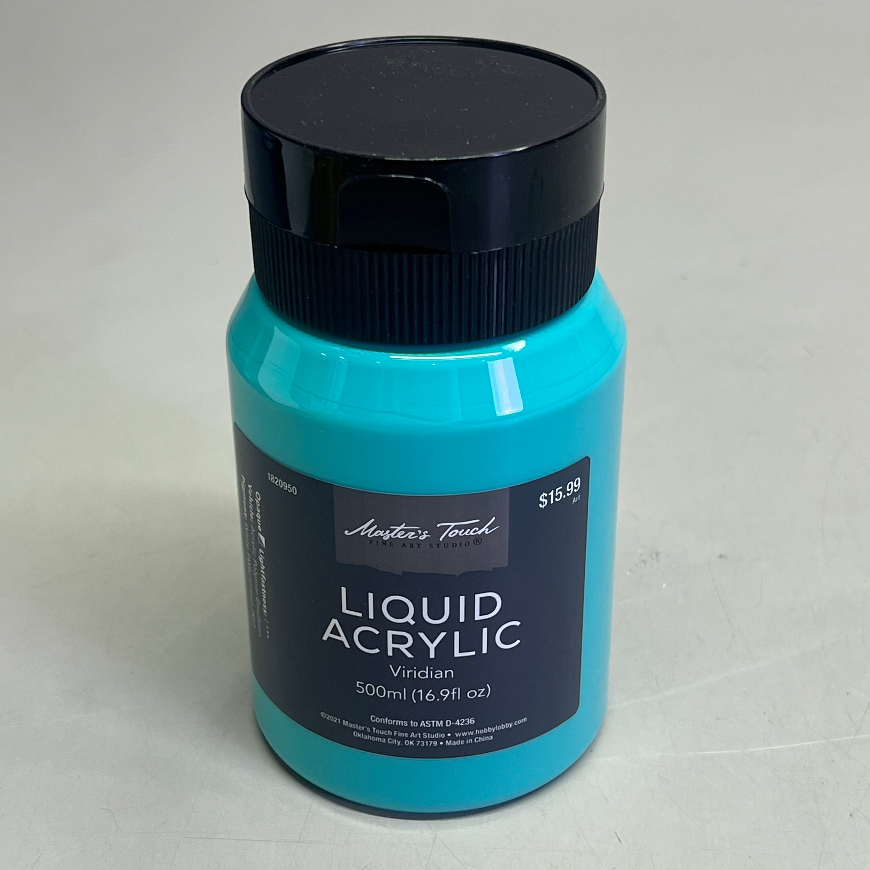 Single bottle of Master's Touch Liquid Acrylic Viridian paint in transparent plastic bottle showing turquoise blue-green paint color with black cap on light gray background