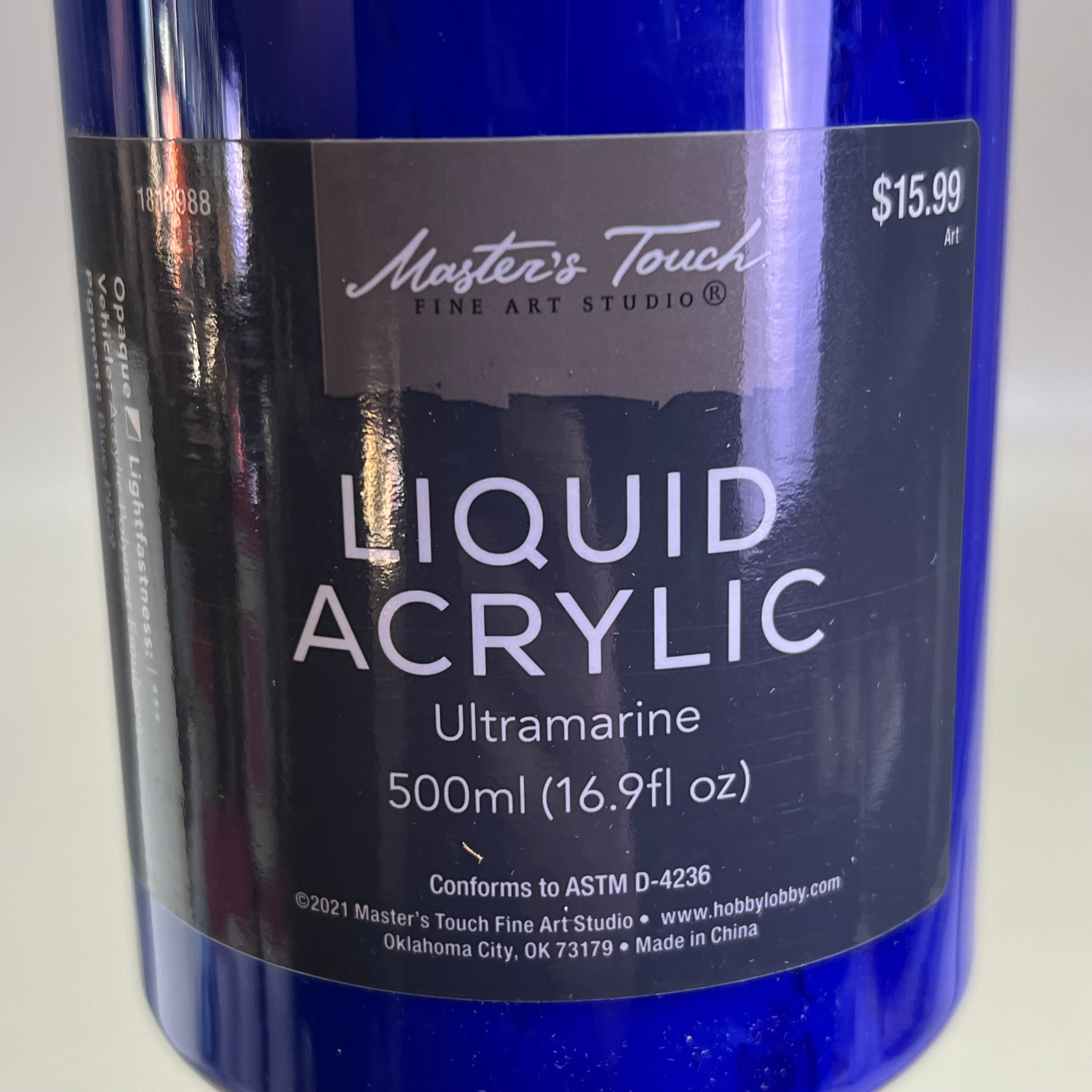 Close up of Master's Touch Liquid Acrylic Paint label showing Ultramarine 16.9 fl oz on white background - artist acrylic paint
