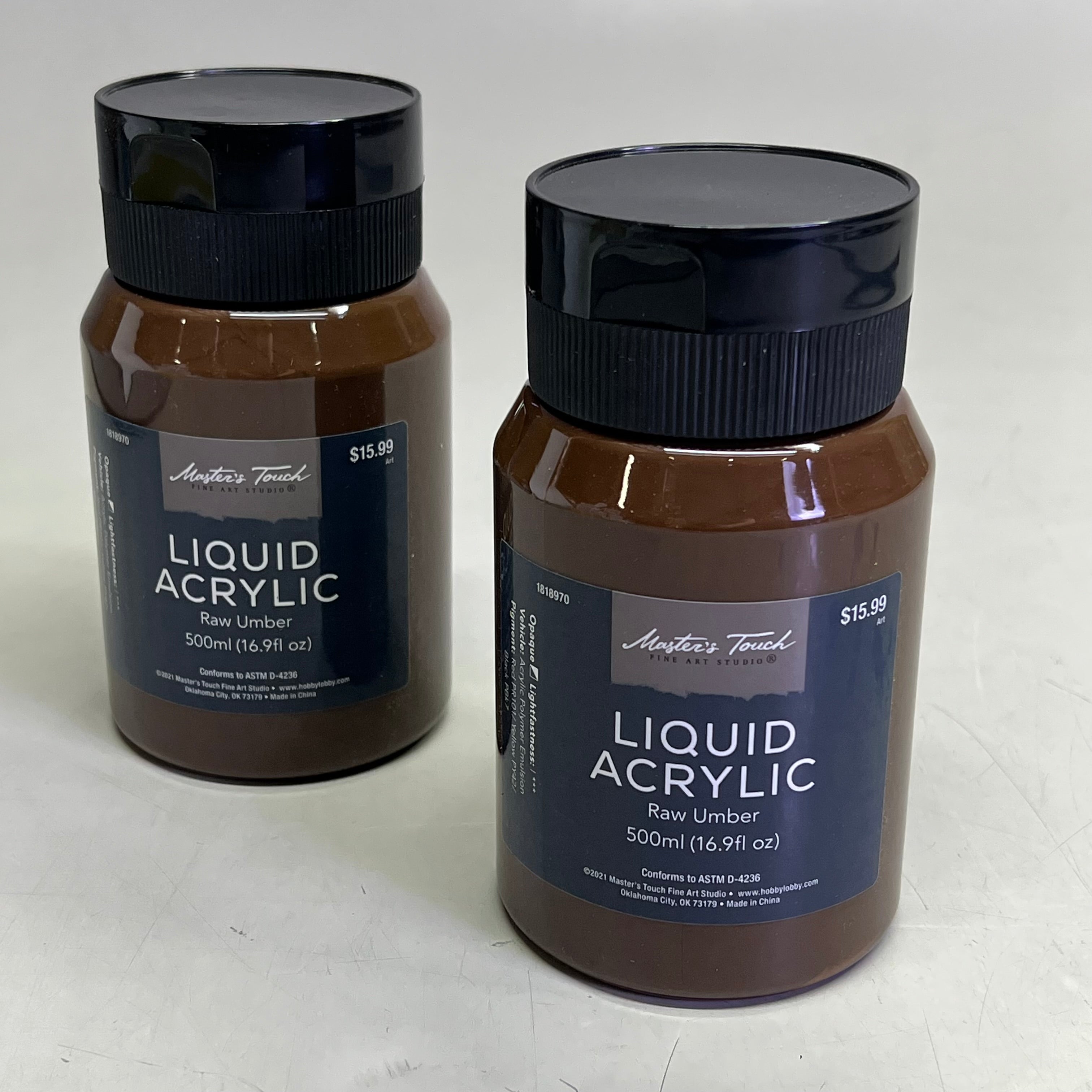 Two bottles of Master's Touch Liquid Acrylic Paint in Raw Umber 16.9 fl oz on gray background - 2 pack artist paint