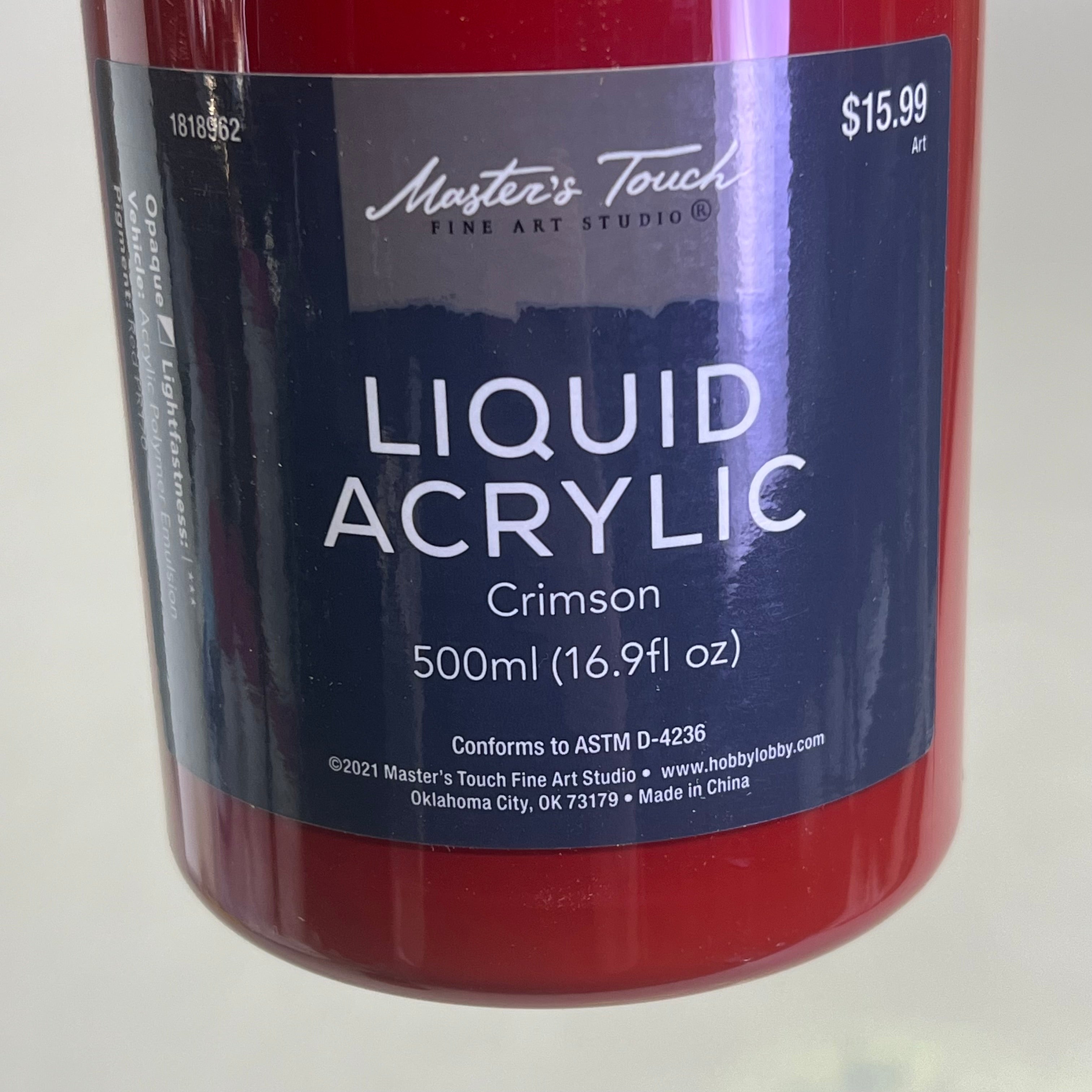 Master's Touch Liquid Acrylic Crimson paint bottle with product label showing transparent plastic bottle with red paint on white background - 16.9 fl oz