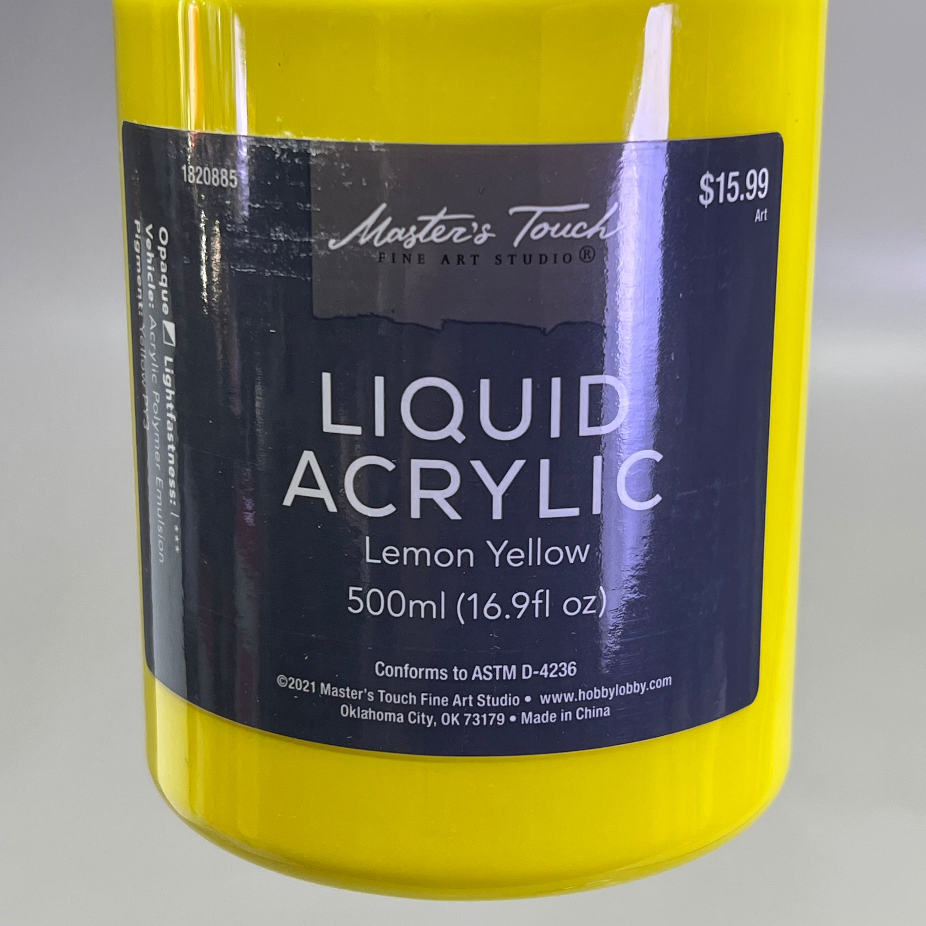 Close up of Master's Touch Liquid Acrylic Paint label showing Lemon Yellow 16.9 fl oz on white background - artist acrylic paint