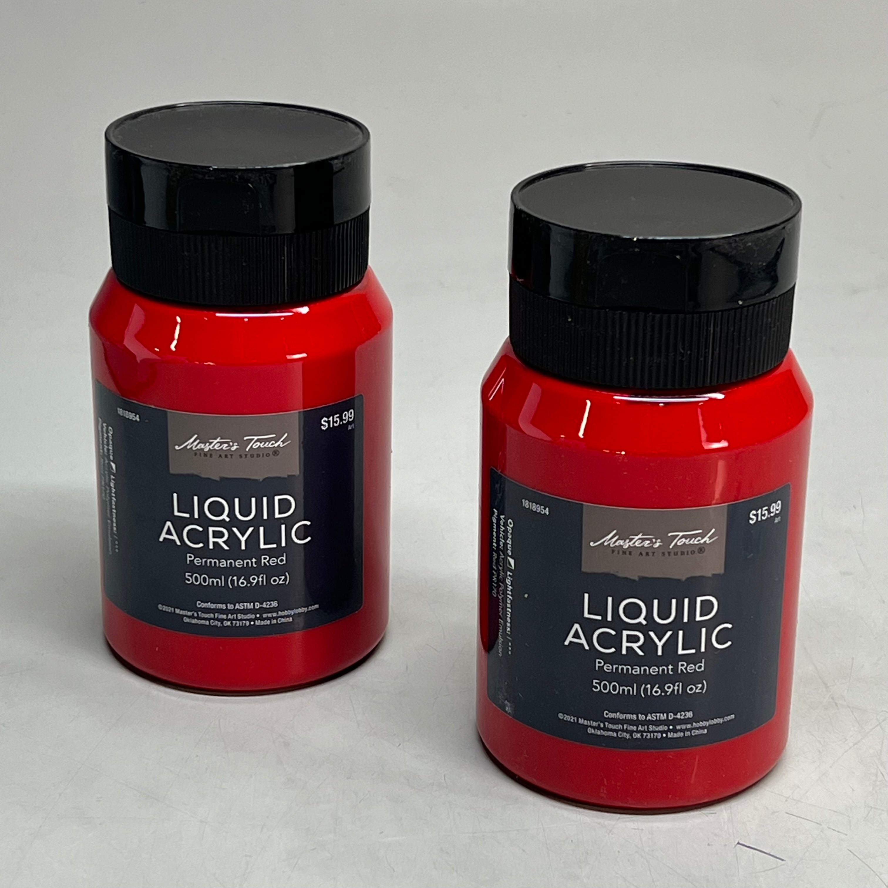 Two bottles of Master's Touch Liquid Acrylic Paint in Permanent Red 16.9 fl oz on gray background - 2 pack artist paint