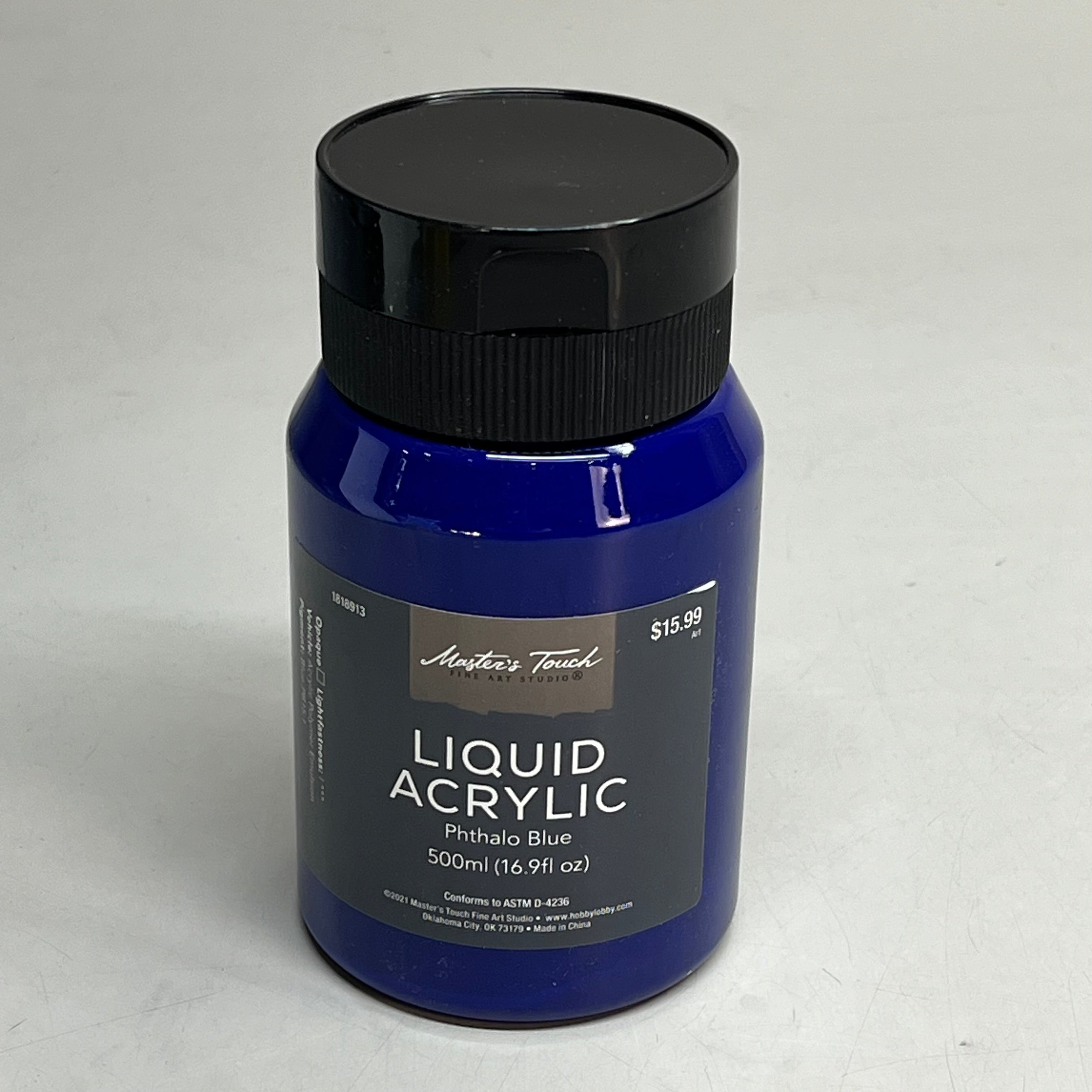 Single bottle of Master's Touch Liquid Acrylic Phthalo Blue paint in transparent plastic bottle showing dark blue paint color with black lid on gray background
