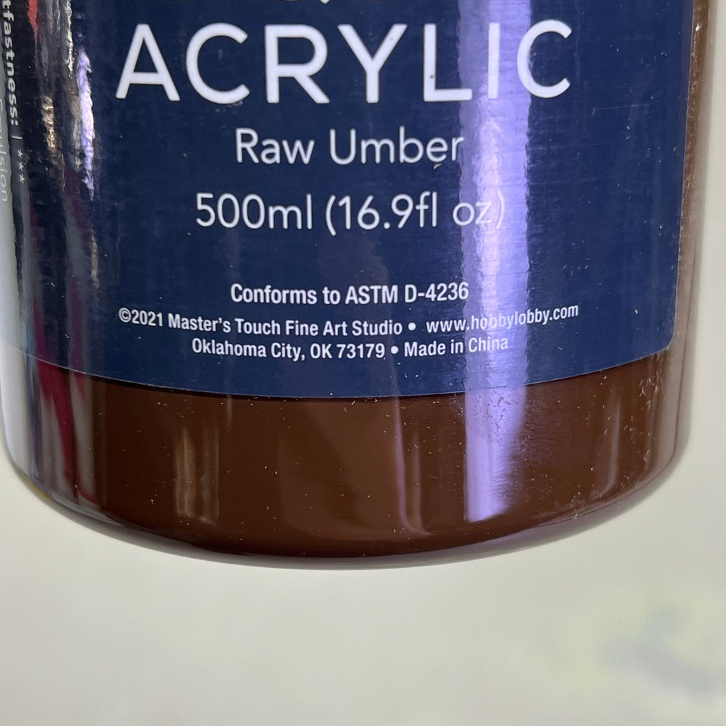Bottom of Master's Touch Liquid Acrylic Paint label showing Raw Umber 500ml 16.9 fl oz on bottle