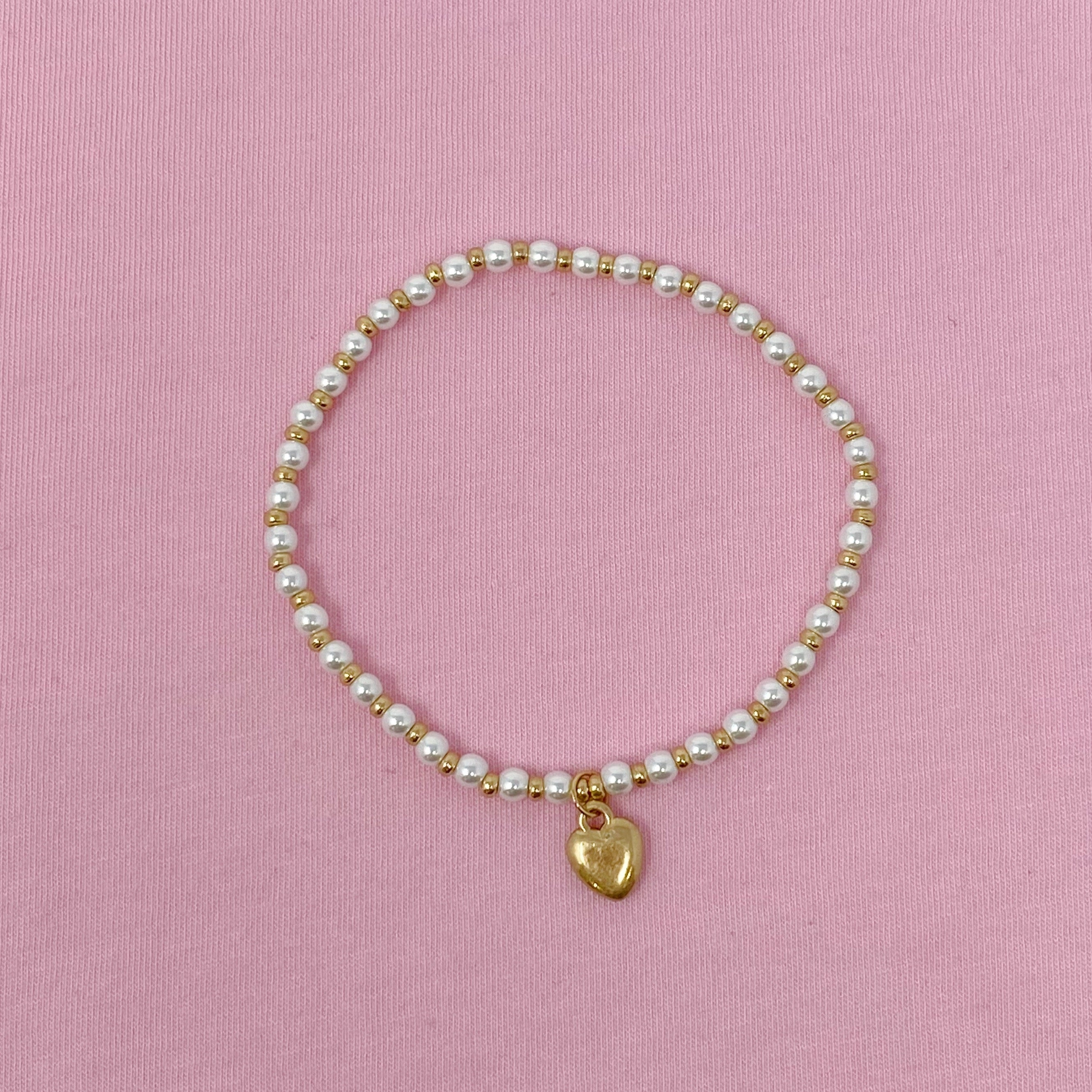 Pearl beaded anklet with gold heart charm on pink background - glass shell pearl Valentine's Day gift