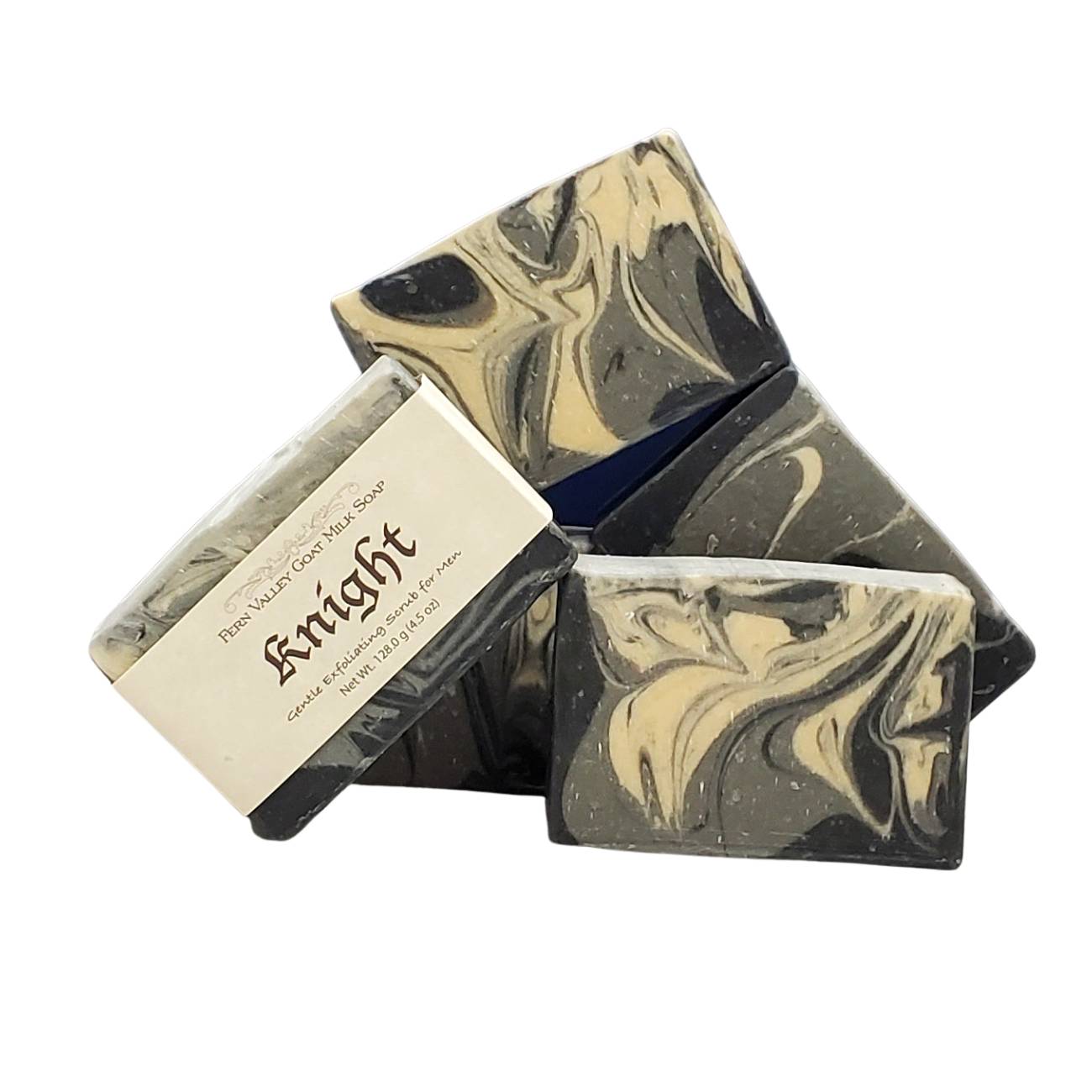 Stack of marbled black and cream Natural Goat Milk Soap Knight bars with Fern Valley label on white background