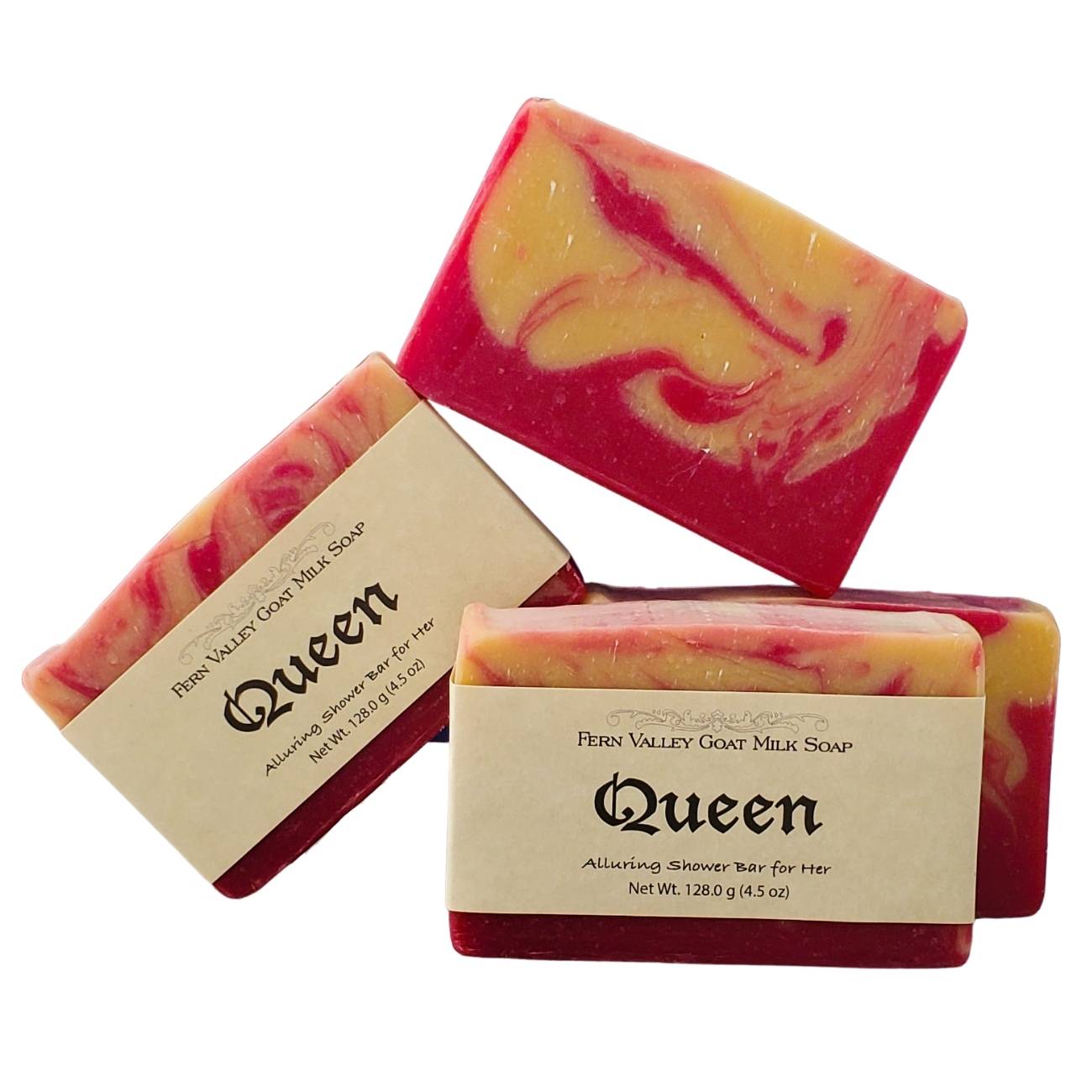 Three bars of Natural Goat Milk Soap Queen with pink and cream marbled design on white background