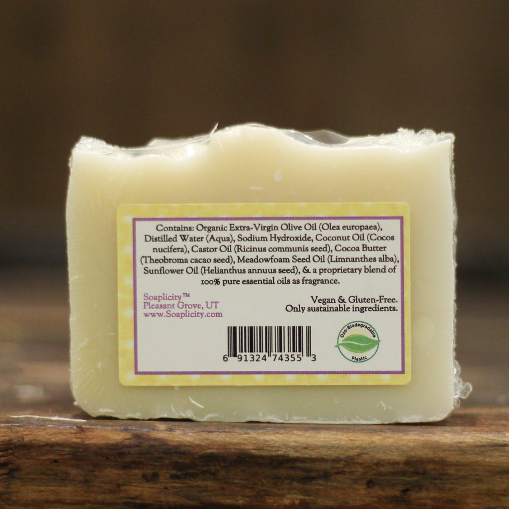 Rock-a-Bye Baby soap ingredients label - natural gentle baby soap bar on wooden surface