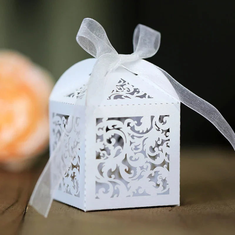 White Flower Vine Decorative Box with intricate cut-out pattern and white ribbon showing see-through design