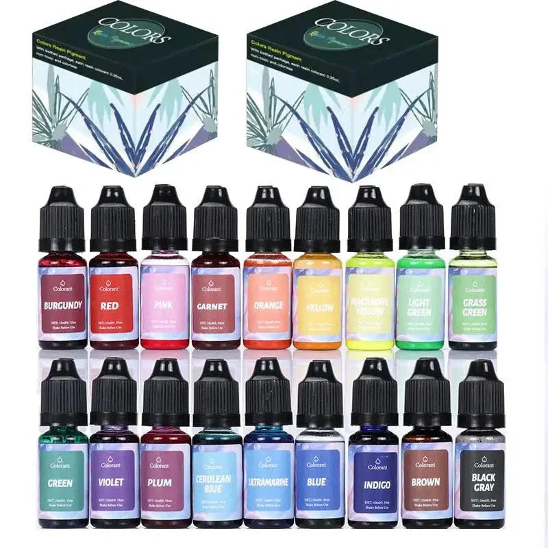 Set of 24 Colors brand liquid dye bottles with their packaging on a white background