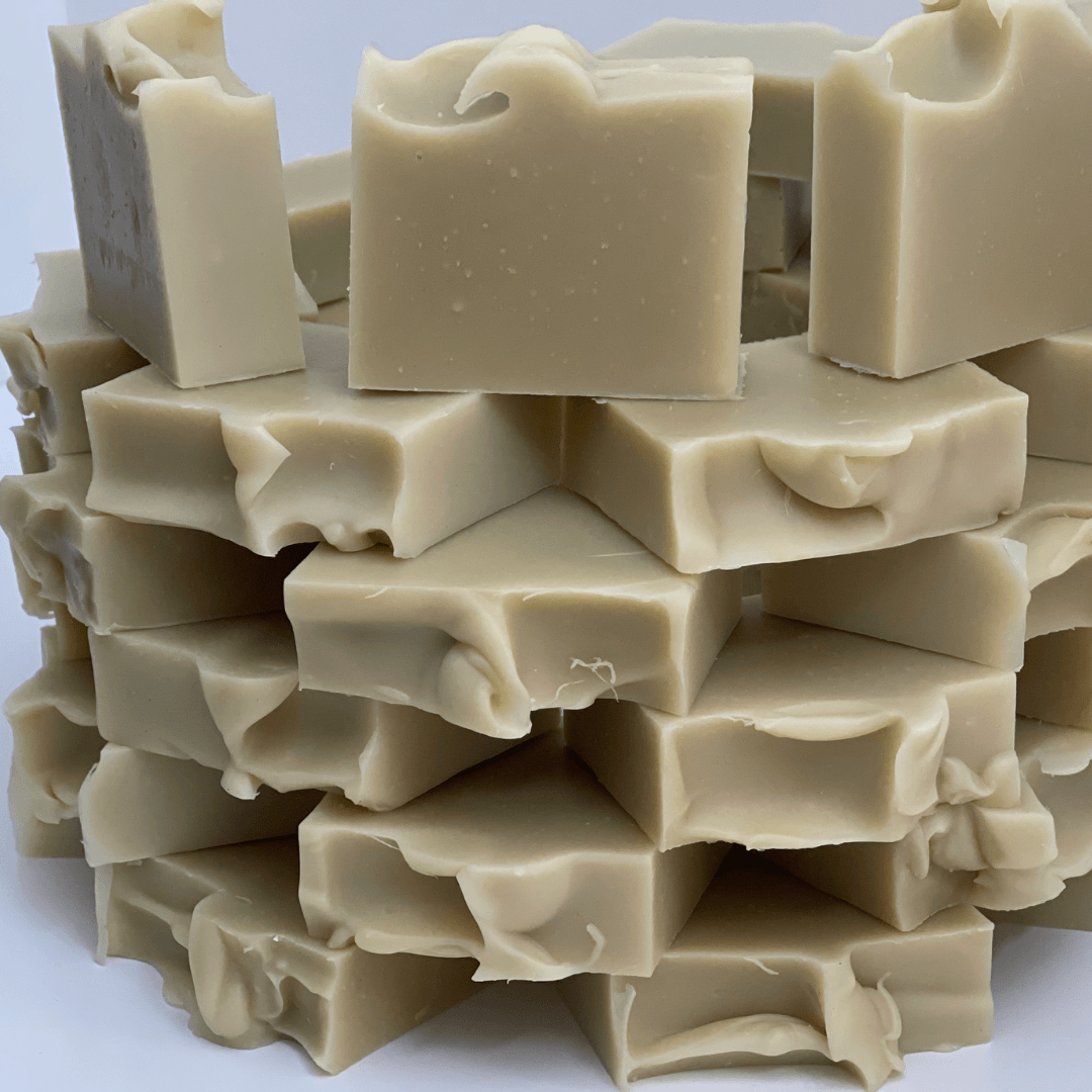 Stack of natural handmade Artisanal Aleppo Style Soap bars on white background