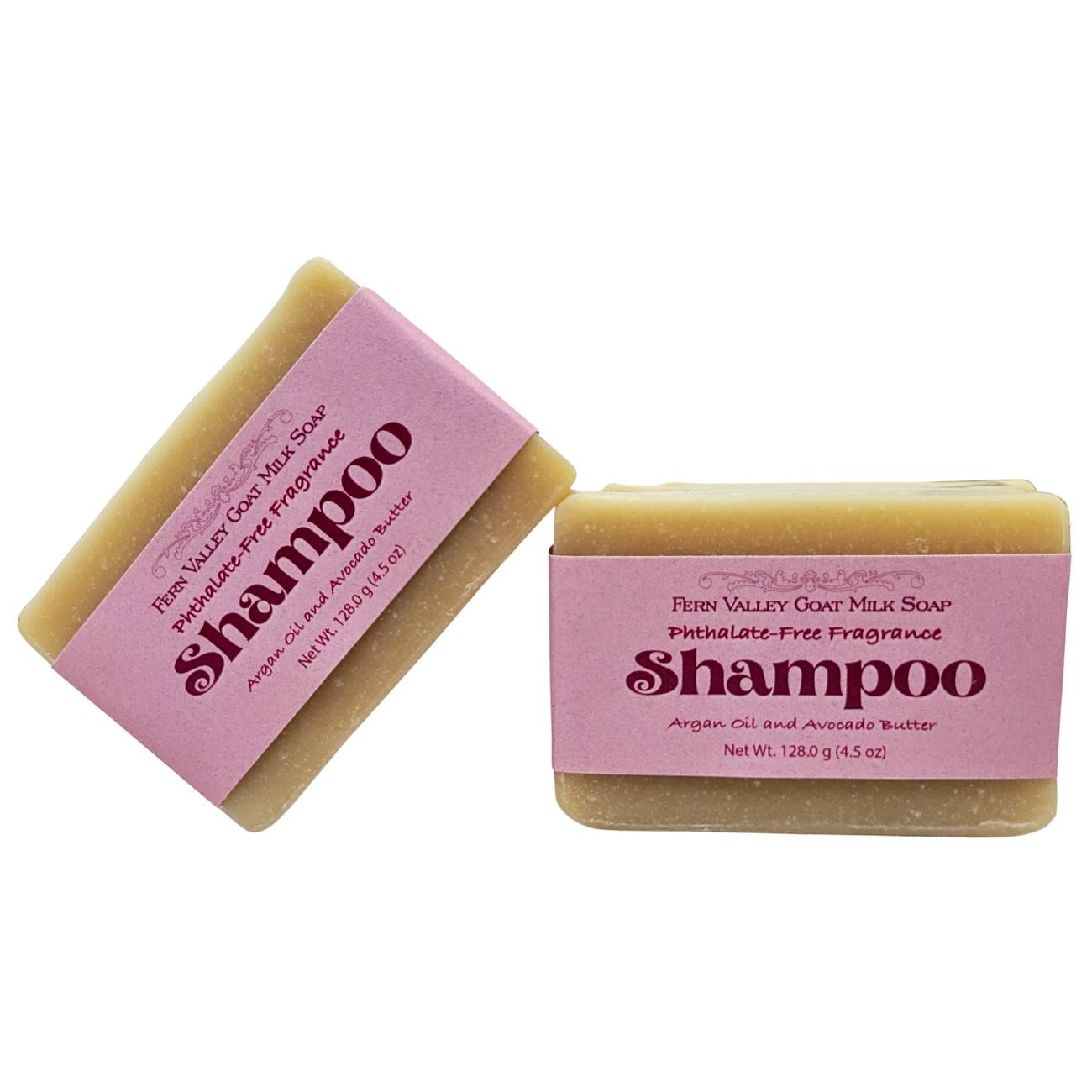 Two bars of Fern Valley Goat Milk Shampoo with pink labels on white background
