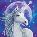 Diamond art unicorn with sparly gemstones against a moon and starry night sky