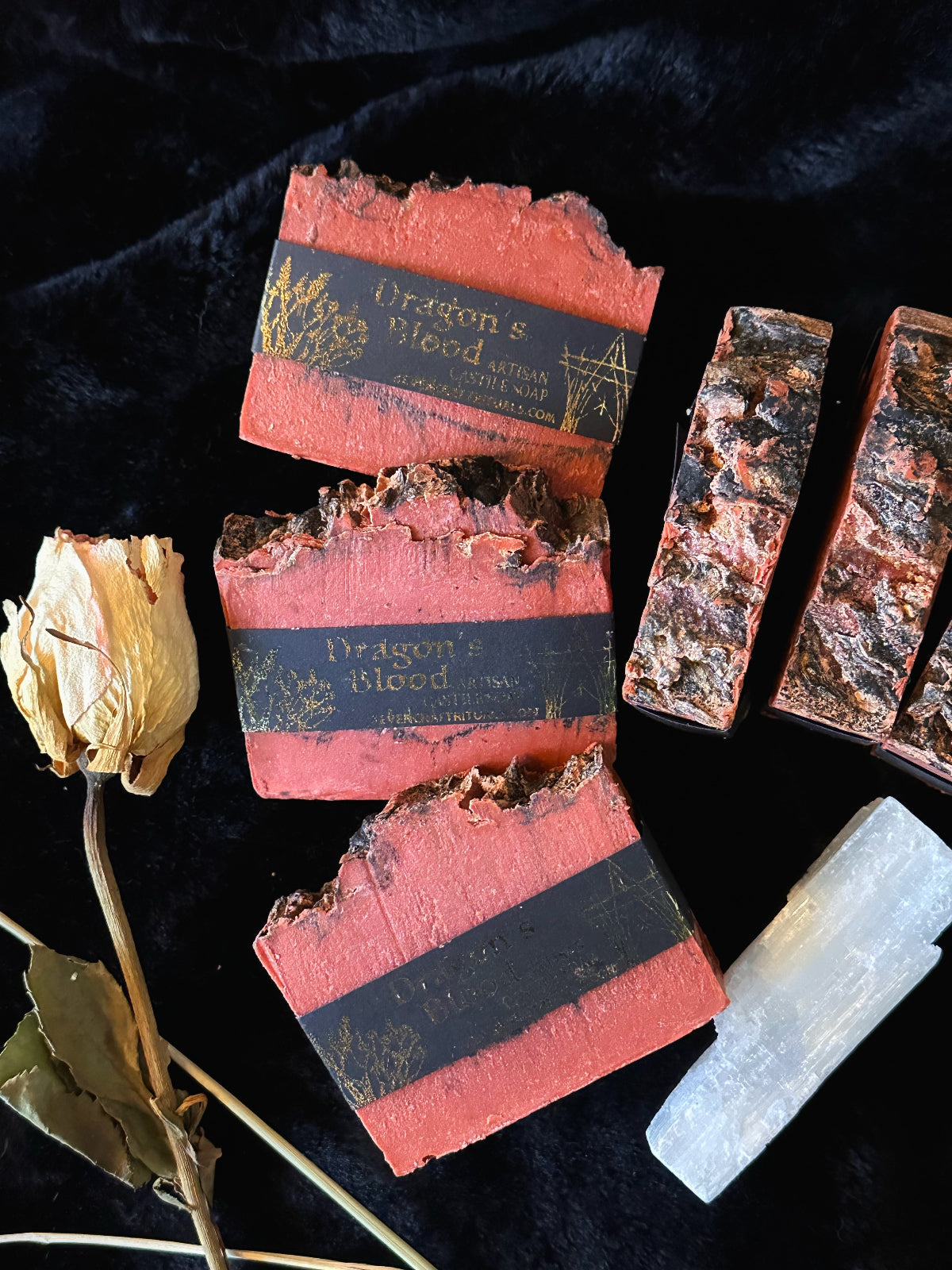 Red Dragon's Blood Artisan Castile Soap bars with black labels on dark background