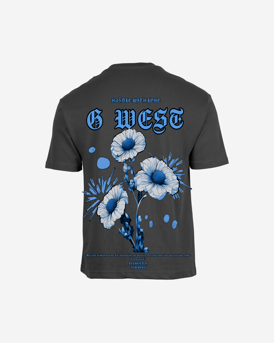 Back view of black oversized t-shirt with blue and white floral bonsai design and G West text on white background - premium cotton graphic tee