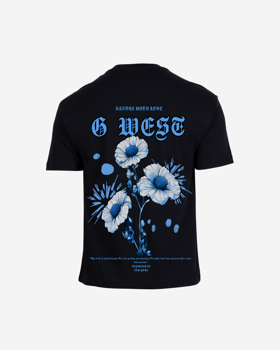Back view of black oversized t-shirt with blue and white floral bonsai design and G West text on white background - NYC printed graphic tee