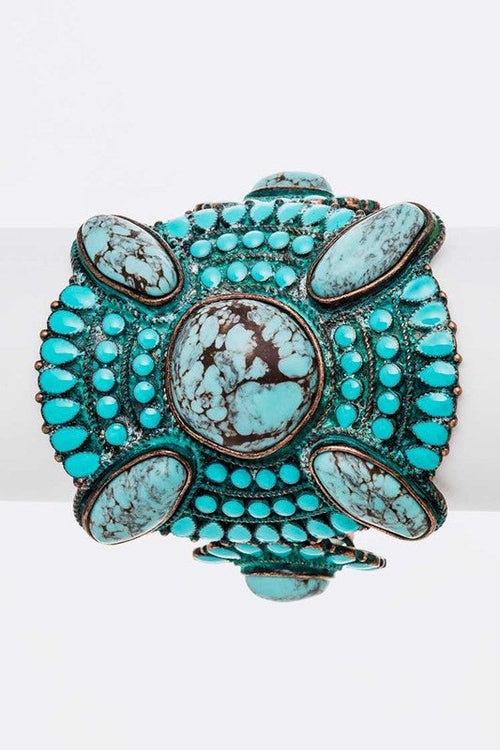 Close-up of genuine turquoise stones in stretch bracelet - spiritual healing boho jewelry