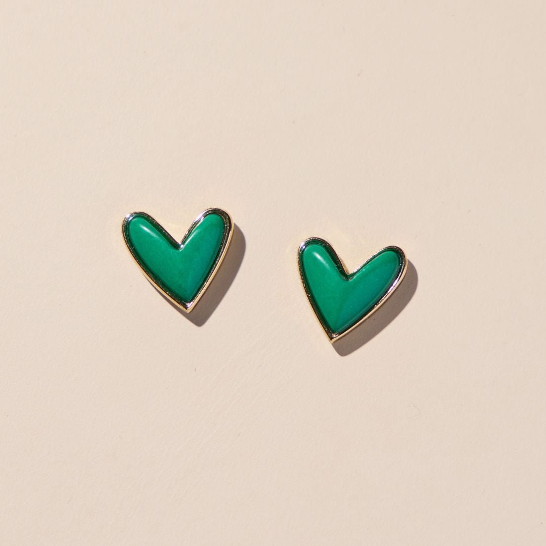 Green heart-shaped stone sweetheart stud earrings with gold bezel setting for St. Patrick's Day