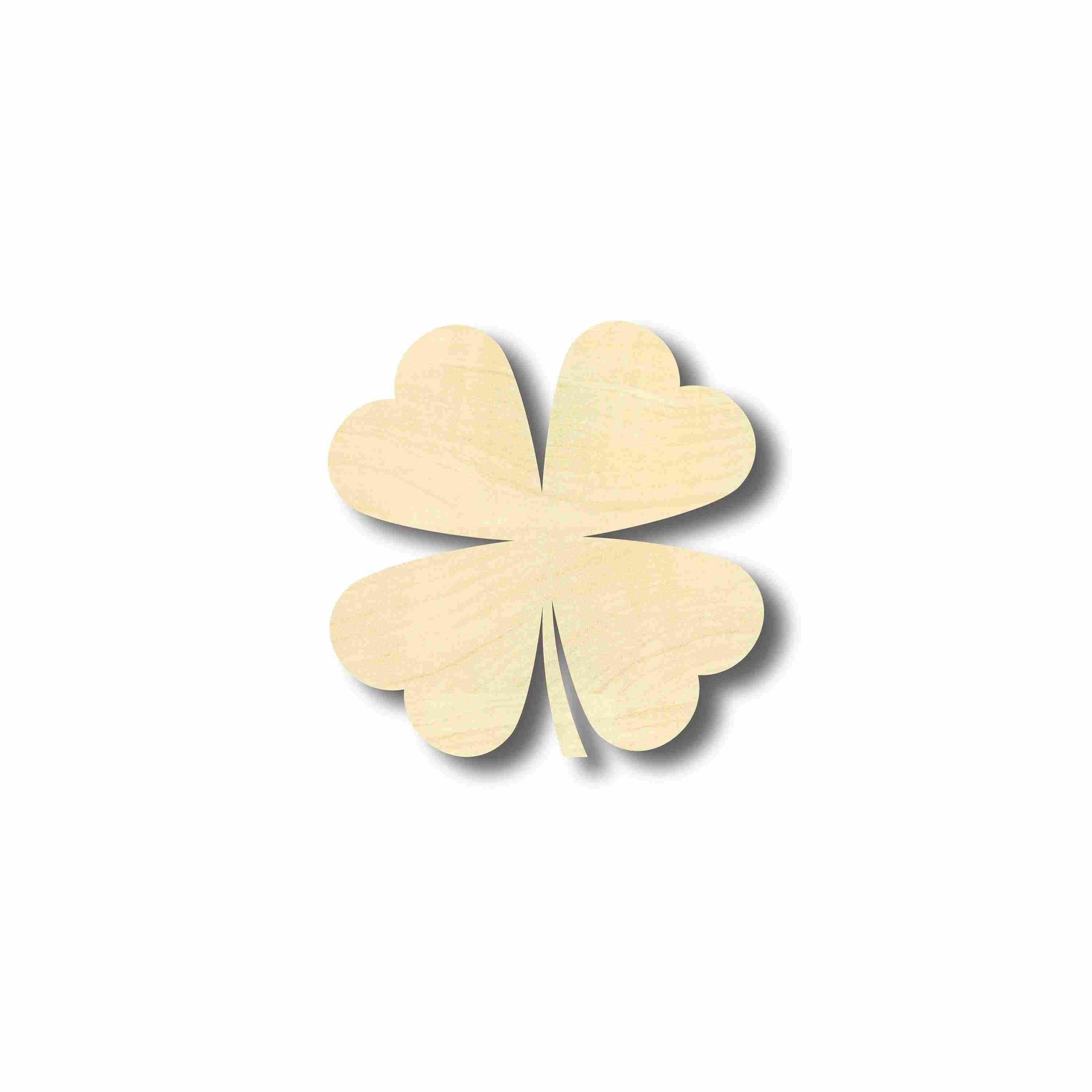 Unfinished wooden four-leaf clover shape on a white background