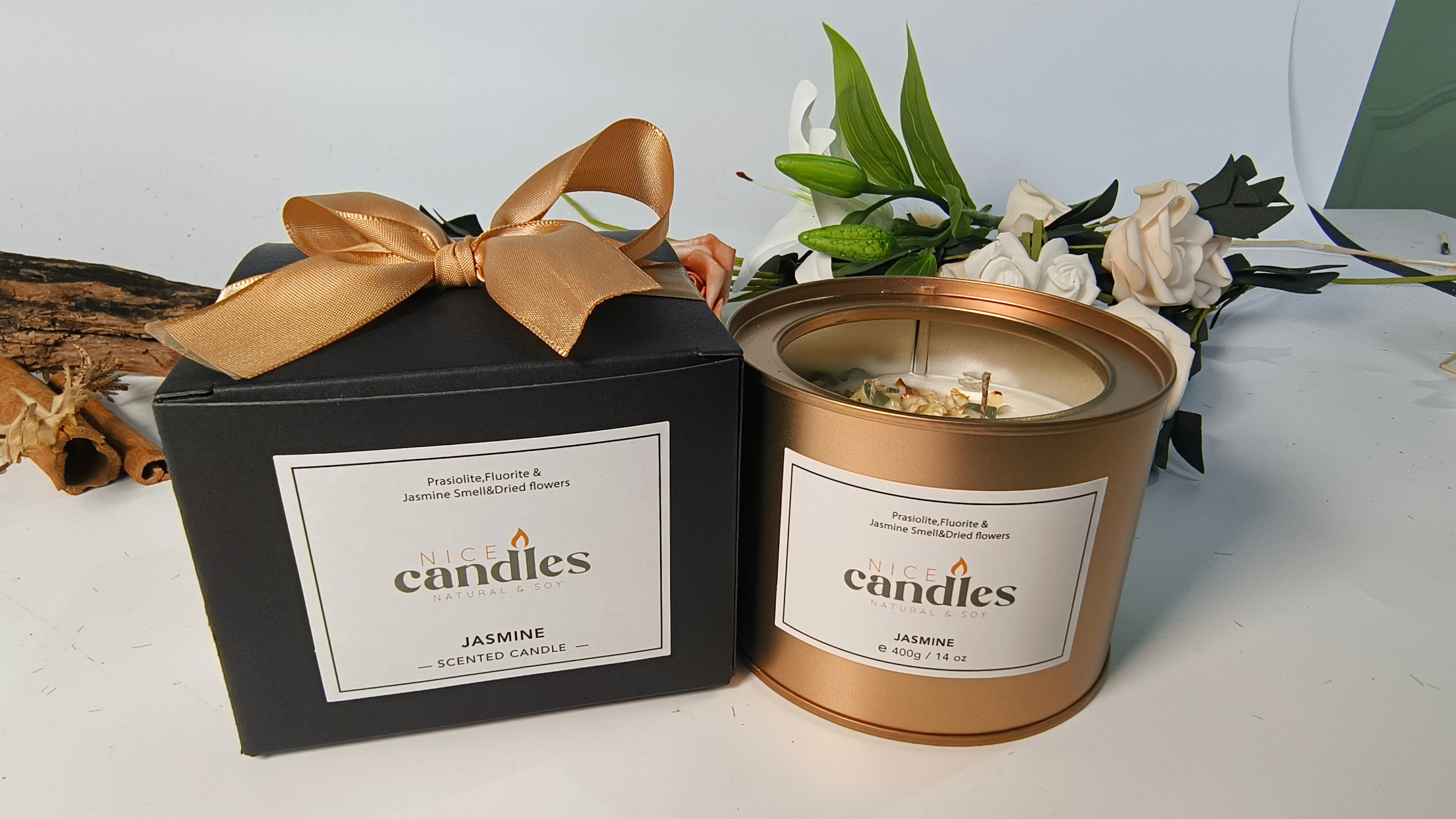 Jasmine essential oil candle with healing crystals in gold container with gift packaging