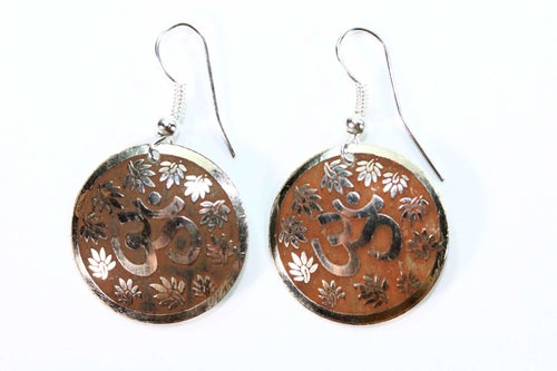 Tan and gold boho Om lotus earrings with intricate petal design - hanging view