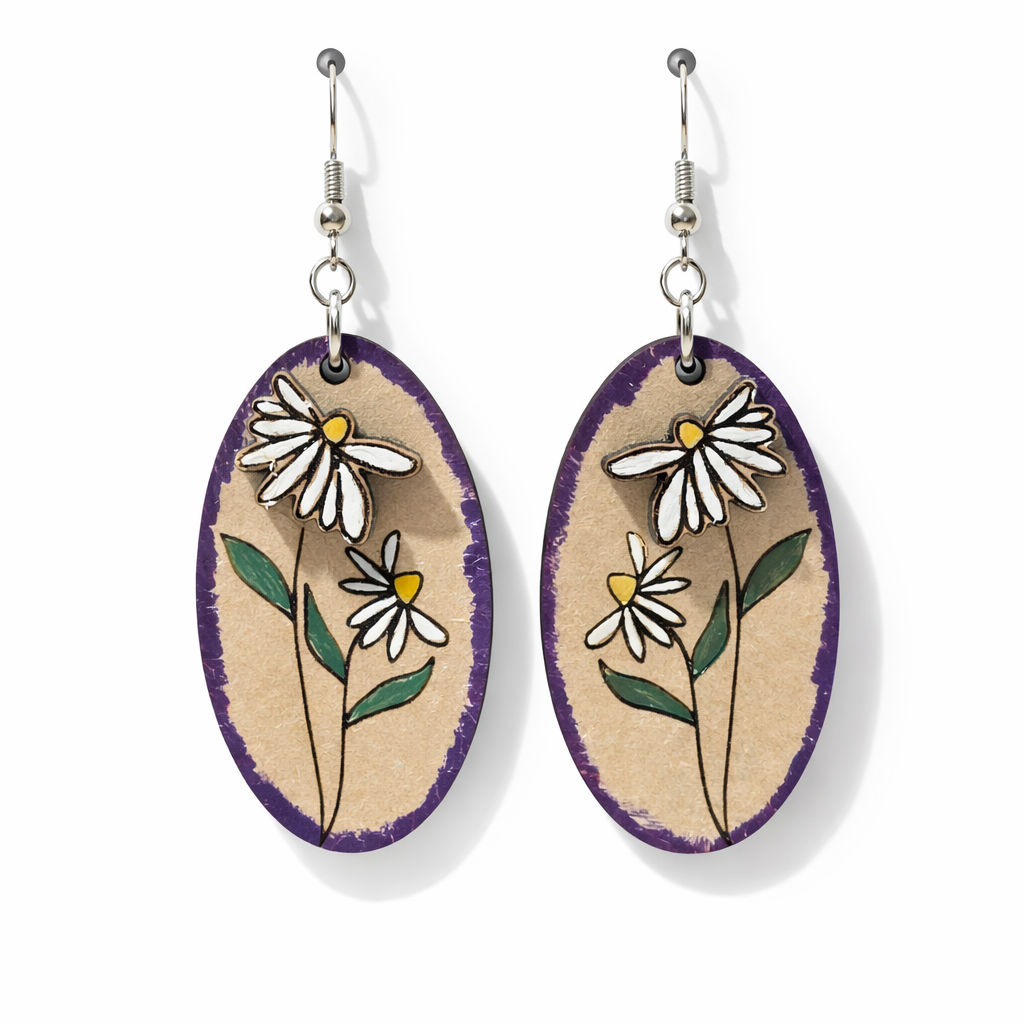 Hand-painted daisy earrings close-up showing white flowers with yellow centers on natural wood oval with purple edge