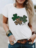 Women's white lucky shamrock clover t-shirt with green and leopard print design for St. Patrick's Day celebrations